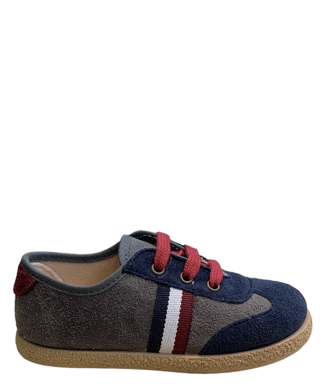 Zapatilla de cordones en gris y azul marino con bandera
